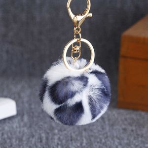 Key Rings Koreaanse DIY Luipaard Print Fur Ball Keychain Imitatie Bont Luipaard Dot Pendant Kledingschoenen Hoeden Tassen Mobiele telefoon Accessoires G230210