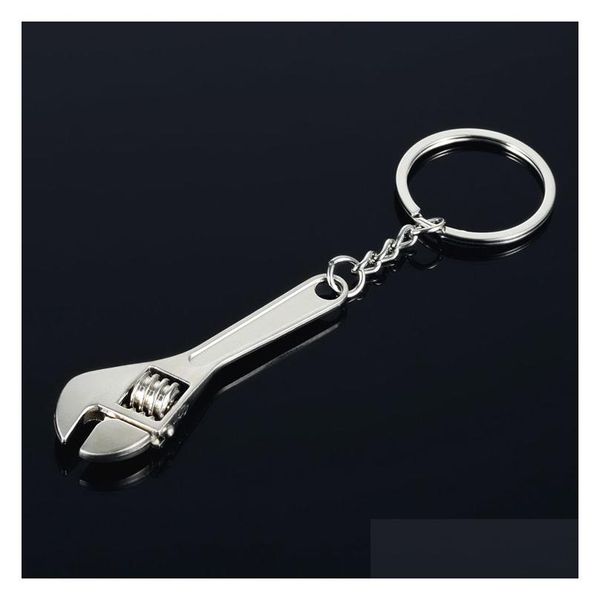 Porte-clés anneau de clé en métal Mini clé à singe porte-clés outil à main mode bijoux sac à main se bloque livraison directe Dhest