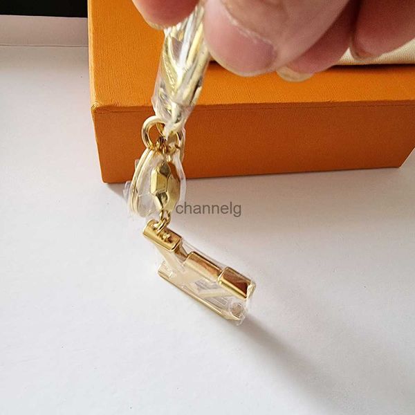 Porte-clés Nouvel alliage d'or design astronaute porte-clés accessoires designer porte-clés en métal massif voiture porte-clés boîte-cadeau emballage 240303