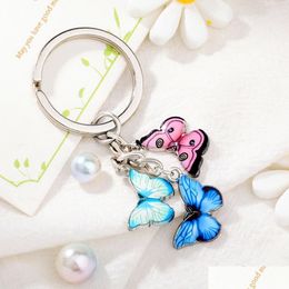 Sleutelringen Nieuwe Colorf Email Butterfly Keychain Insecten Auto Key Dames Tas Accessoires Sieraden Geschenken Mode Keyring Charms Je YYDHHOME DHZMU