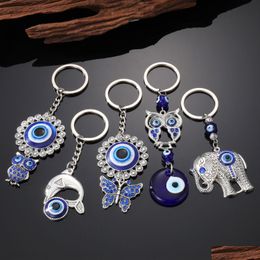 Porte-clés Hibou Dauphin Fleur Elaphant Forme Mauvais Oeil Porte-clés Pour Femmes Hommes Bleu Charms Pendentif Sac Accessoires De Voiture Drop Deli Dhgarden Dhpj0