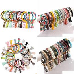 Sleutelhangers Pu Lederen Armband Sleutelhanger Zonnebloem Luipaard Polsbandje Ring Tassel Bangle Hanger Party Favor 300Pcs Wht0228 Drop Deliver Dh25W