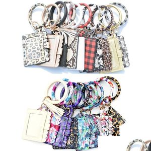 Porte-clés Porte-cartes en cuir PU avec bracelets Porte-cartes d'identité Porte-monnaie Tassel Party Favors 19 couleurs Drop Delivery Jewelry Dhrif