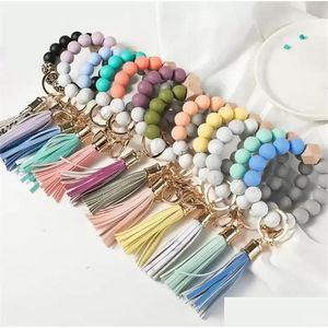 Key Rings Ups 14 Colors Beaded Bracelets Jewelry Wooden Tassel Bead String Bracelet Chain Food Grade Sile Beads Women Girl Ring Wris Dhpvl