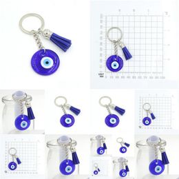 Belangrijkste ringen Groothandel 30 mm Ceramics Blue Turkish Evil Eye Keychain autohouder Keyring voor vrouwen Men Sieraden Gift Tassel Charm Drop Deli Otelj