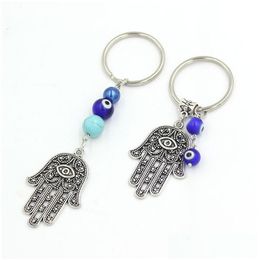 Porte-clés en gros chanceux Hamsa Fatima main porte-clés voiture porte-clés bleu turc mauvais œil chaîne pour femmes hommes bijoux cadeau livraison directe Otaww