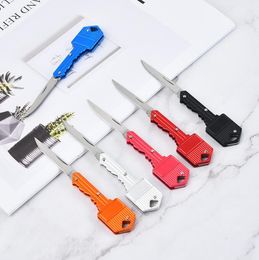 Llavero con forma de llave, Mini cuchillo plegable, cuchillo de fruta de bolsillo con sable para exteriores, llavero multifuncional, autodefensa suiza