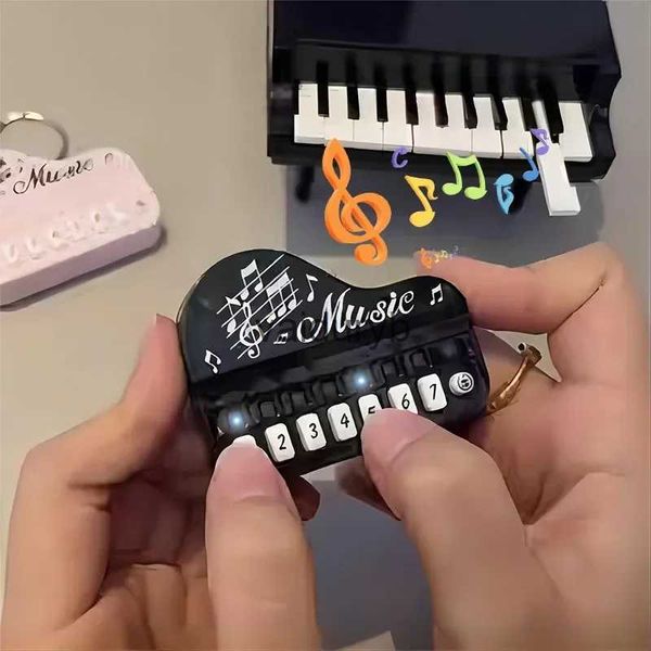 Claviers Piano Mini Clavier Électronique Porte-clés Instrument de Musique Portable Jouet Piano Porte-clés Mini Réel Travail Doigt Piano Porte-clésvaiduryb