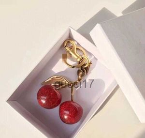 Porte-clés style cerise couleur rouge Chapstick Wrap rouge à lèvres couverture équipe baume à lèvres Cozybag pièces mode mode YVXT