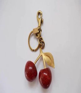 Porte-clés style cerise couleur rouge Chapstick Wrap rouge à lèvres couverture équipe baume à lèvres Cozybag pièces mode fashion1552188