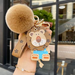 Porte-clés designer porte-clés luxe sac charme femmes mignon petit lion classique floral voiture porte-clés pendentif hommes mode dessin animé couple porte-clés cadeau exquis agréable