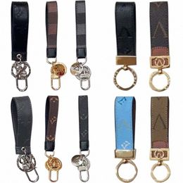 Men Keyring Car Keychain Diseñador Cadena de llaves Lugar Luxury Luxury Leather Dragonne Multicolor WomenyUp#