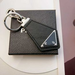 Porte-clés design porte-clés de luxe en cuir design tempérament style polyvalent porte-clés mode personnes design cadeau de Noël très sympa A5K01