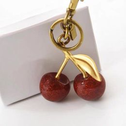 Keigner des clés clés clés de luxe Chaîne de clés de clés Lonyards Cherry Heart Coeur Bow Red Key Ring Pendante Sac Accessoires Fashion Ami Cadeau