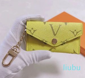 Porte-clés mode femmes Mini portefeuille haute qualité breloque pour sac en cuir véritable hommes pièce de monnaie couleur porte-cartes