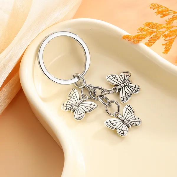 Papillon breloque porte-clés pendentifs bricolage hommes bijoux voiture porte-clés porte-anneau Souvenir pour cadeau