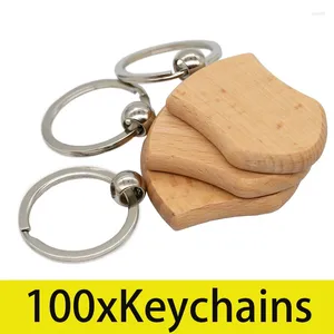 Keychains 100pcs Shield Forme vide en bois de la chaîne de clés en bois Blanks en bois avec porte-clés pour artisanat de cadeau de bricolage