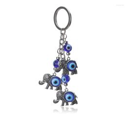 Porte-clés 1pc bleu mauvais œil charmes porte-clés éléphant pendentif porte-clés alliage gland voiture bijoux de mode