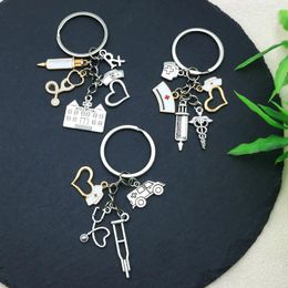 Keychains 1pc Creative Staff Keyring for Festival Gift Tool Charm portefeuille sac à dos car clés décoration