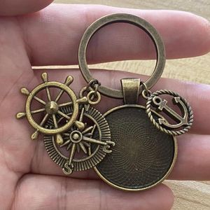 Keychains 1 -piece 25mm cabochon blanco base 3colors sleutelhanger anker hangers roer charmes diy fit glazen sleutel ring sieraden maken ambachten