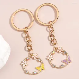 Keychains 1set (2pcs) mignon en émail en émail porte-clés fleur papillon cristal clés jardin chaînes pour cadeaux d'amitié bijoux faits à la main