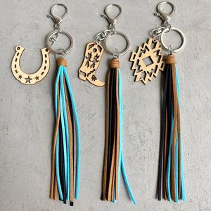 Porte-clés 2023 Style de gros Style européen et américain Pendentif Aztec Horseshoe Denim Bois Rétro Vieux Cuir Pompon Porte-clés