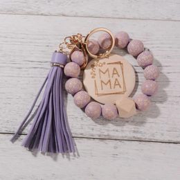 Porte-clés 2024 MAMA Bracelet Porte-clés pour femmes Tassel Bracelet Sac Pendentif Accessoire Léopard Imprimer Bois Perle Porte-clés Cadeau de la Fête des Mères