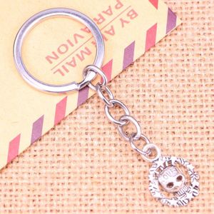 Keychains 20pcs mode Keychain 15 mm Circle Skull Squelette Love Pendants Diy Men Bijoux Car Key Chain Chain Ring Holder Souvenir pour cadeau