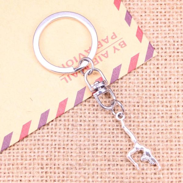 Porte-clés 20pcs mode porte-clés 30x11mm gymnastique gymnaste sportif pendentifs bricolage hommes bijoux voiture porte-clés souvenir pour cadeau