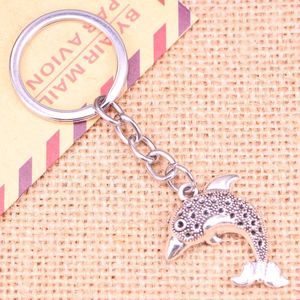 Keychains 20pcs mode clé 33 26 mm Dolphin Ocean Sea Pendants Diy hommes bijoux Car Key Chain Chain Ring Holder Souvenir pour cadeau