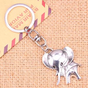 Porte-clés 20pcs mode porte-clés 37 31 mm grandes oreilles éléphant pendentifs bricolage hommes bijoux voiture porte-clés porte-anneau souvenir pour cadeau