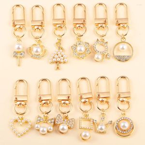 Keychains 2pcs Luxury Crystal Pearl Crown Bowknot Love Heart Hanging Keechain For Women Girls Fashion Hands Hands Earphone Cas