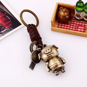 Porte-clés 3D stéréoscopique mini rétro punk peau de vache tricoté porte-clés en cuir porte-clés voiture décoration en métal bijoux cochon bronze pendentif cadeau