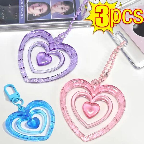 Keychains 3pcs colorido colgante de corazón hueco cadena de llave de llave amando cadenas de acrílico amuletos de auriculares adornos de coches para automóviles