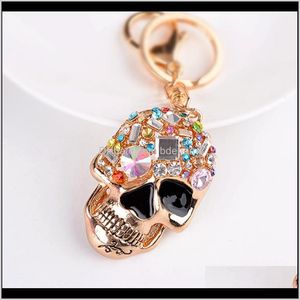 Keychains aessories Drop levering 2021 Rhinestone Skeleton -kettingfilm rond mode Keychain Classic Keyrings Skull Key Ring Pendant JE