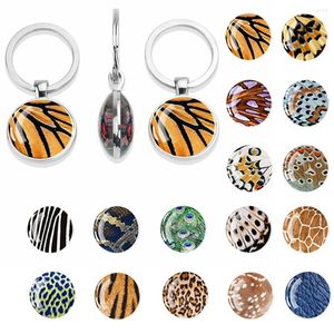 Porte-clés motif de texture de peau d'animal porte-clés Liebao tigre ailes de papillon zèbre paon serpent double face dôme en verre accessoire cadeau