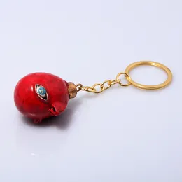 Llaveros Anime Berserk Behelit Llavero Guts Griffith Huevo de Rey Colgante Cadena de cuerda vintage para mujeres Hombres Cosplay Joyería