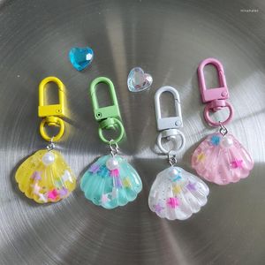 Porte-clés coloré Y2k esthétique étoile pentagramme paillettes coquille porte-clés pour les femmes doux mignon créatif amusant mode pendentif accessoires