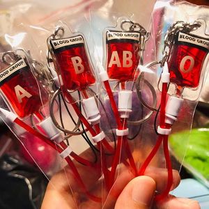 Sleutelhangers Creatieve A B O Ab Sick Plasma Pack Sleutelhanger Auto Tas Hanger Decoratie Cool Verjaardagsfeestje Cadeau Sieraden voor koppels