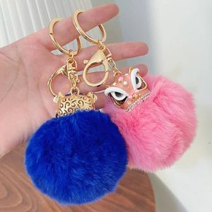 Keychains Ball de fourrure de danse de lion chinois mignon pour femmes sac charme pendentif Car clés accessoires de mode manche de la mode.