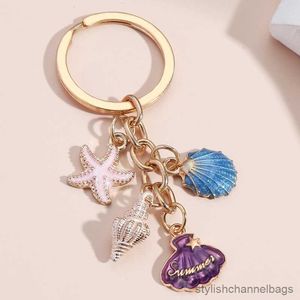 Porte-clés mignon porte-clés coloré étoile de mer coquille porte-clés plage porte-clés mer Souvenir cadeaux pour femmes filles bijoux