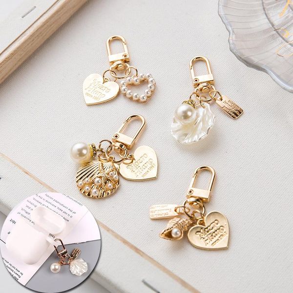 Llaveros lindo melocotón amor corazón Shell llavero joyería creativa Metal perla lujo Airpods colgante moda pareja regalo