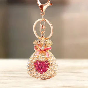 Llaveros lindo Rhinestone cristal rosa suerte corazón bolsa dinero llavero fortuna llavero anillo titular colgante llavero