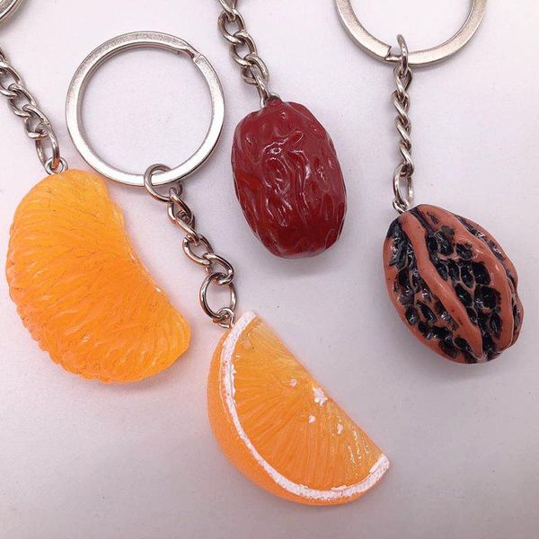 Porte-clés mignon simulation noix fruits orange porte-clés bibelot simple charmes alimentaires femmes filles sac pendentif bijoux accessoires de voiture porte-clés