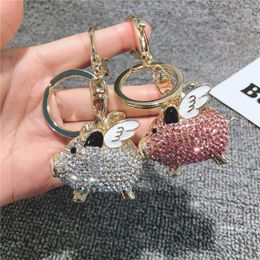 Keychains Diamond Flying Piggy Key Chain For Women Hair Ball Car Ring Paar Kleine geschenk rugzak sieraden hanglamp luxe Fred22