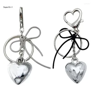 Keychains Elegant Heart en forme de clés de porte clés de clés à bowknot de clés élégant pendentif de mode parfait pour les occasions spéciales