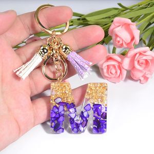 Keychains Exquisite Resin Initiële letter Keychain Women Foil Alfabet sleutelring met kwast Bag Charmauto Pendent Holder Accessoire