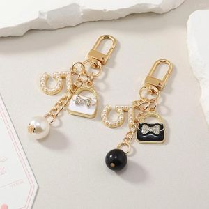 Porte-clés exquis strass sac à main forme porte-clés mode imitation perle numéro 5 porte-clés téléphone chaîne femmes sac pendentif bijoux cadeau