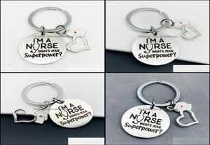Porte-clés Accessoires de mode 10pc en acier inoxydable charme femmes sac porte-clés porte-bijoux je suis une infirmière pendentif porte-clés hôpital Da8789383