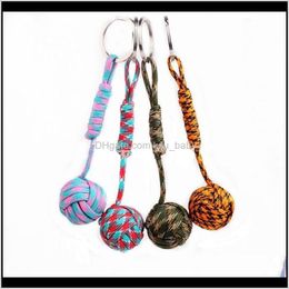 Keychains mode-accessoires drop levering 2021 aap vuist knoop sleutel ketens gesp zelfverdediging kern sleutelhangers staal steel overleving paracord lanyar